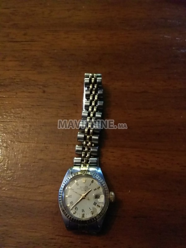 Montre Rolex 26 mm, perpétuel justdate.