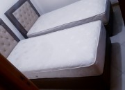 Photo de l'annonce: Deux lits rabattables + matelas ressort